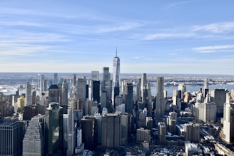 city skyline under blue sky during daytime