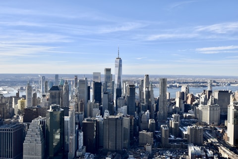 city skyline under blue sky during daytime