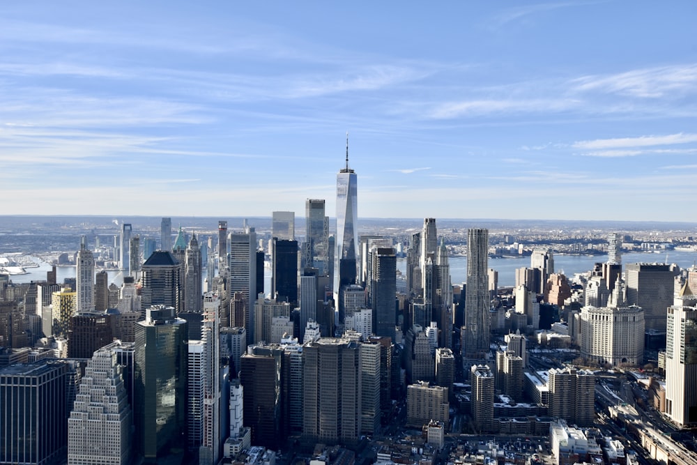 city skyline under blue sky during daytime