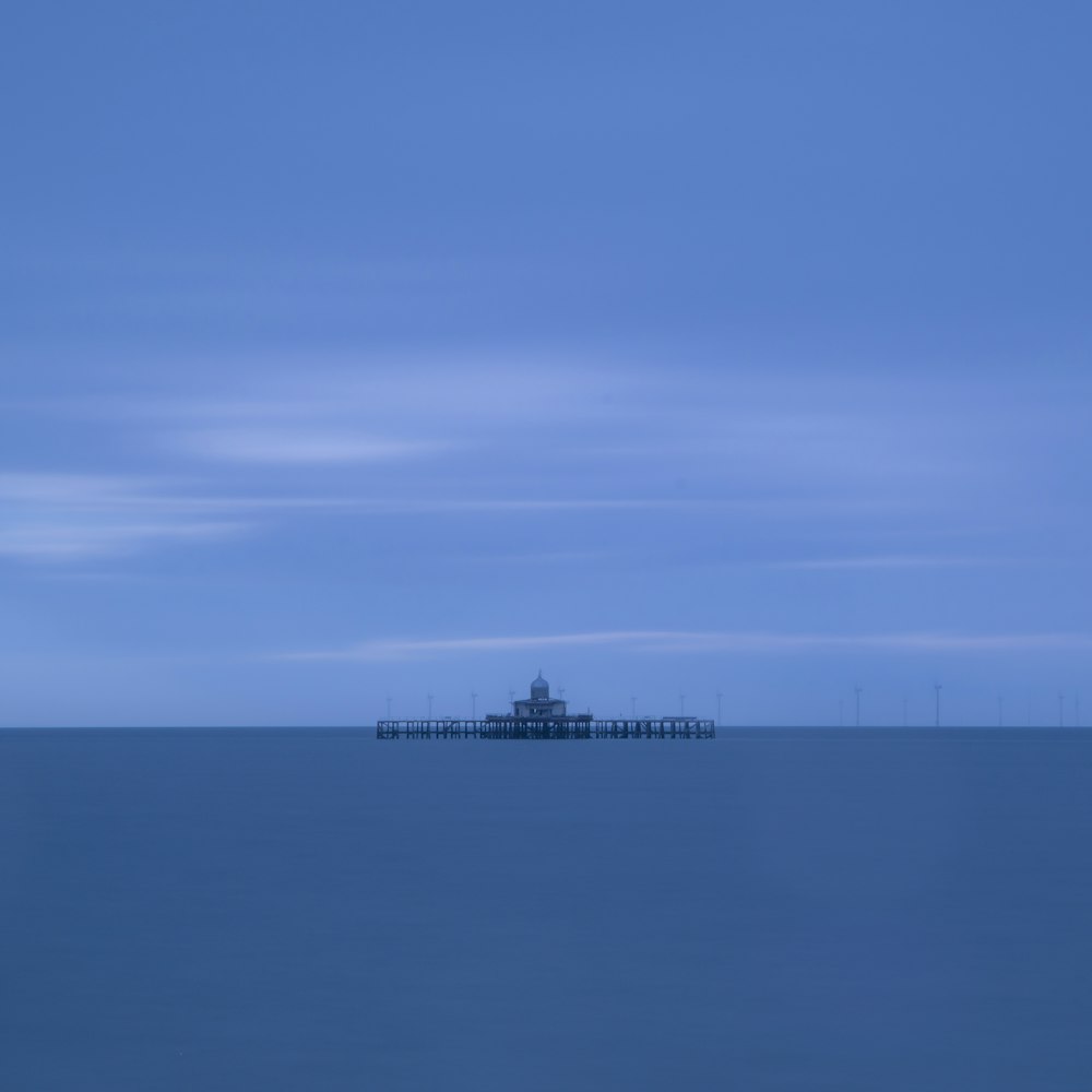 body of water under blue sky during daytime