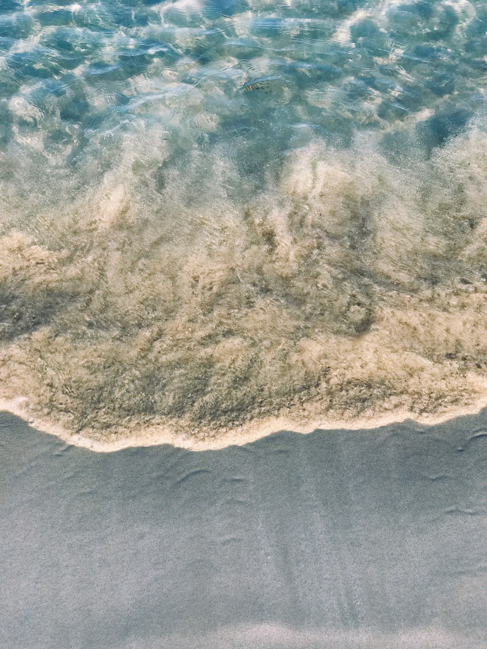 brown and white ocean waves