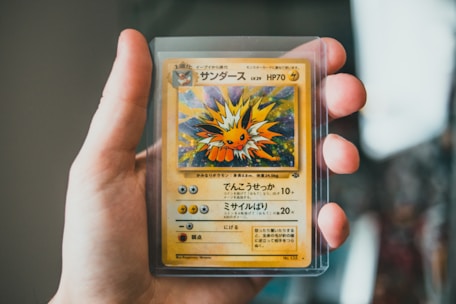 yellow and white trading card