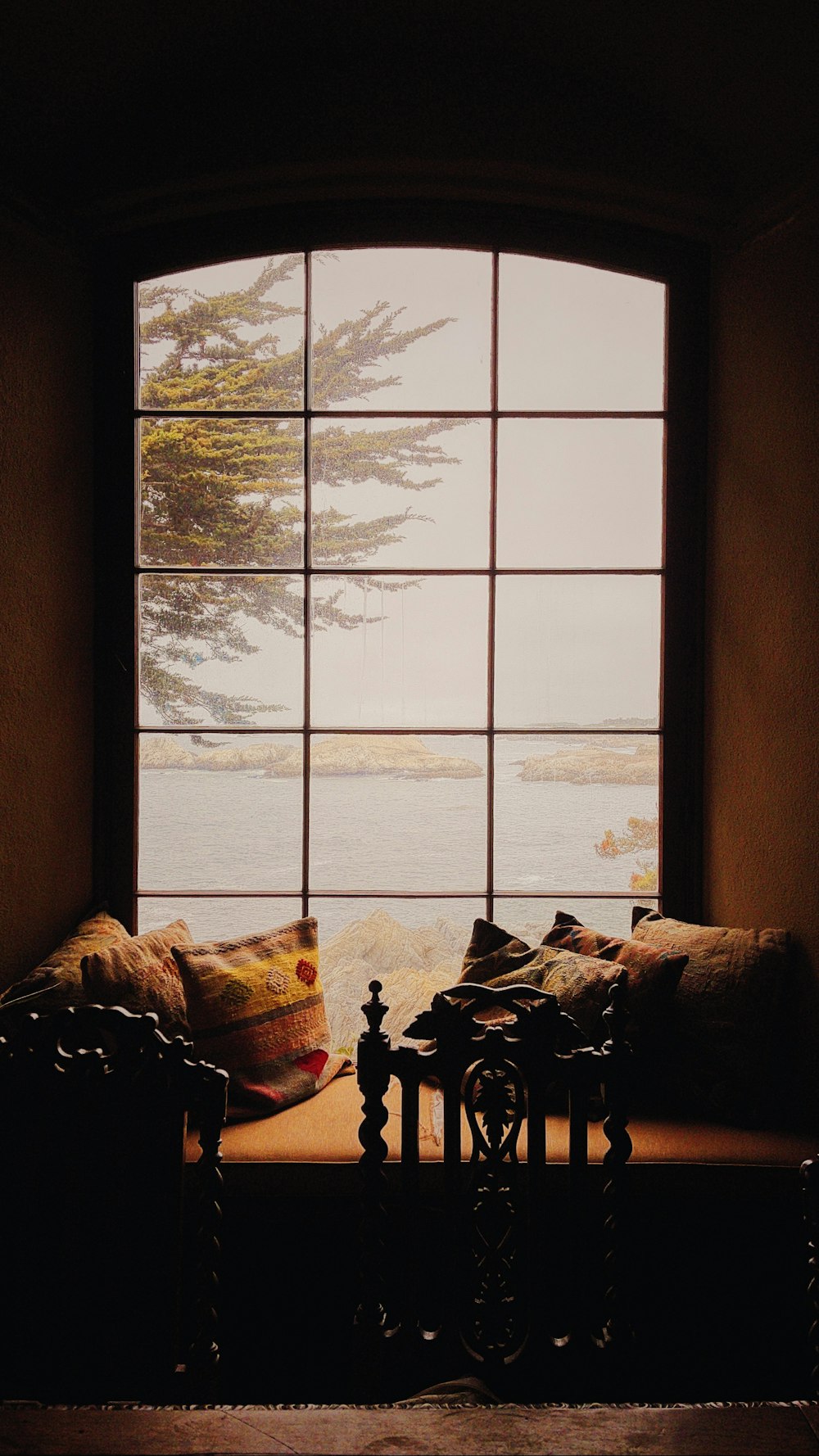 brown wooden framed glass window