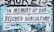 A large poster with bold black lettering reads 'In Memory of Our Beloved Subculture' pasted on a wall covered in graffiti and various stickers. The background shows a mix of blue and teal tones with visible street art and advertisements.