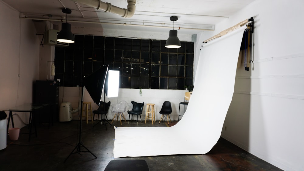 white and black table and chairs