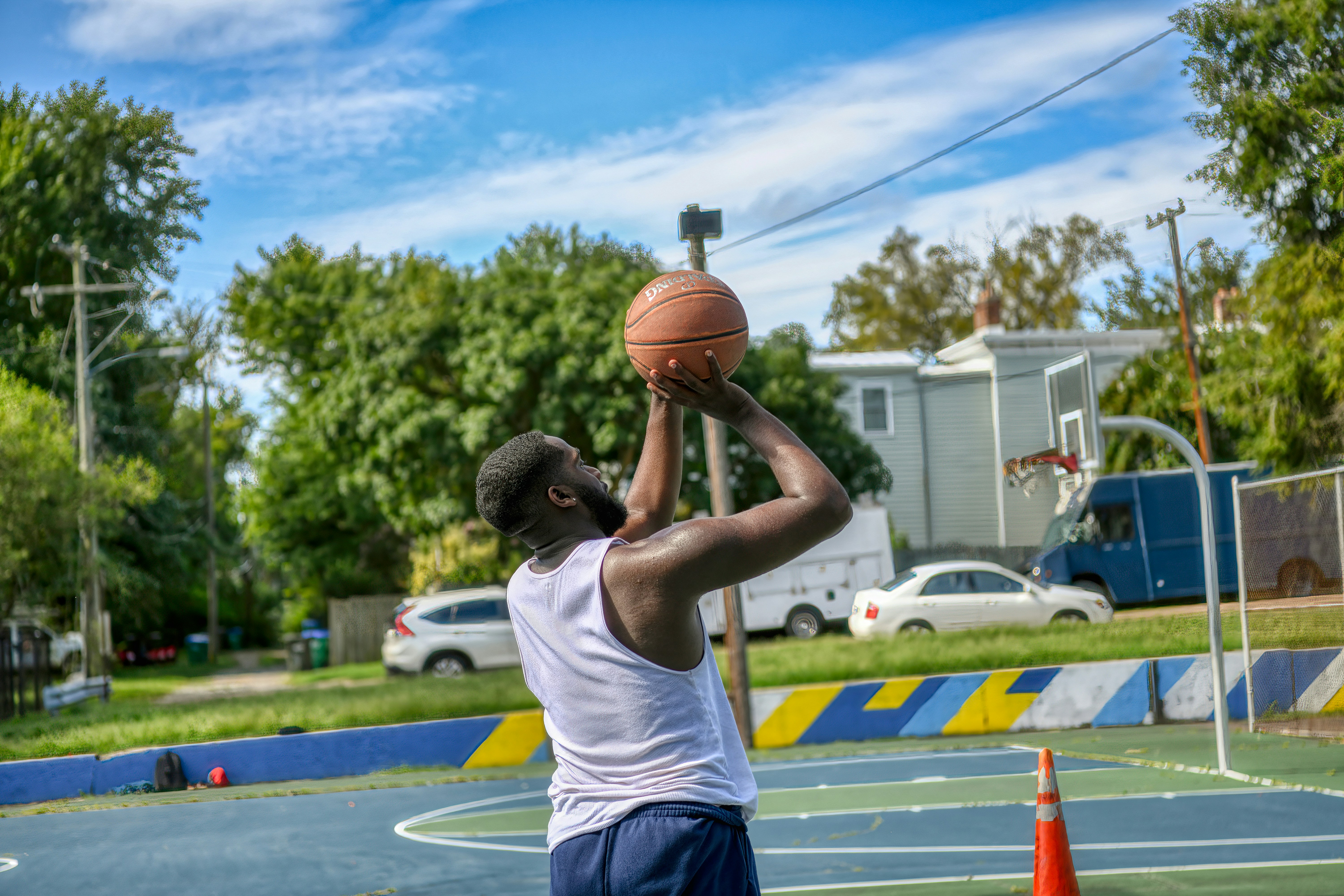 Basketball player on city courts, Richmond, VA