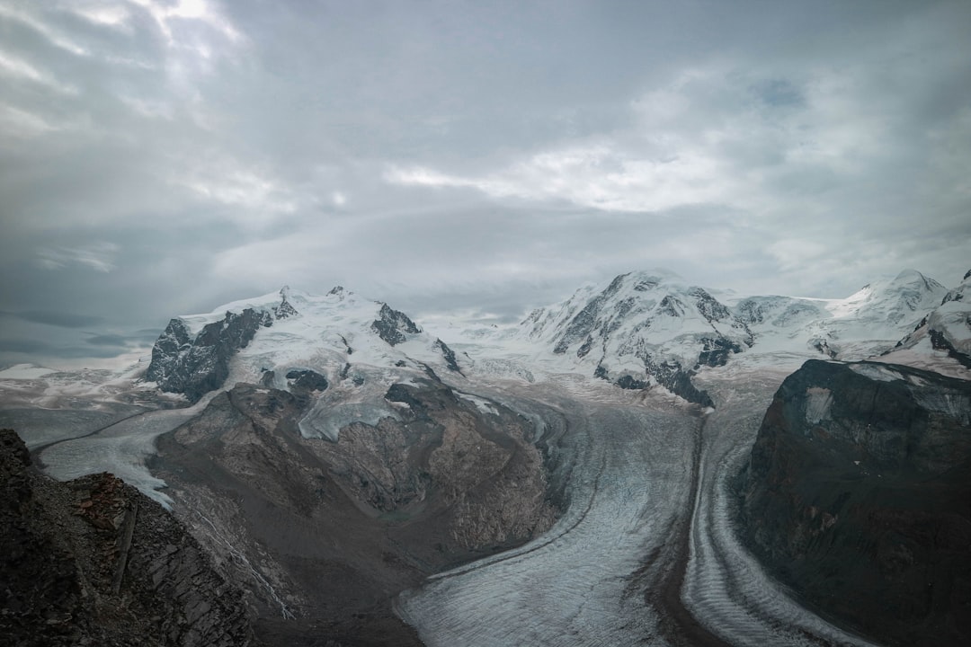 snow covered mountain during daytime