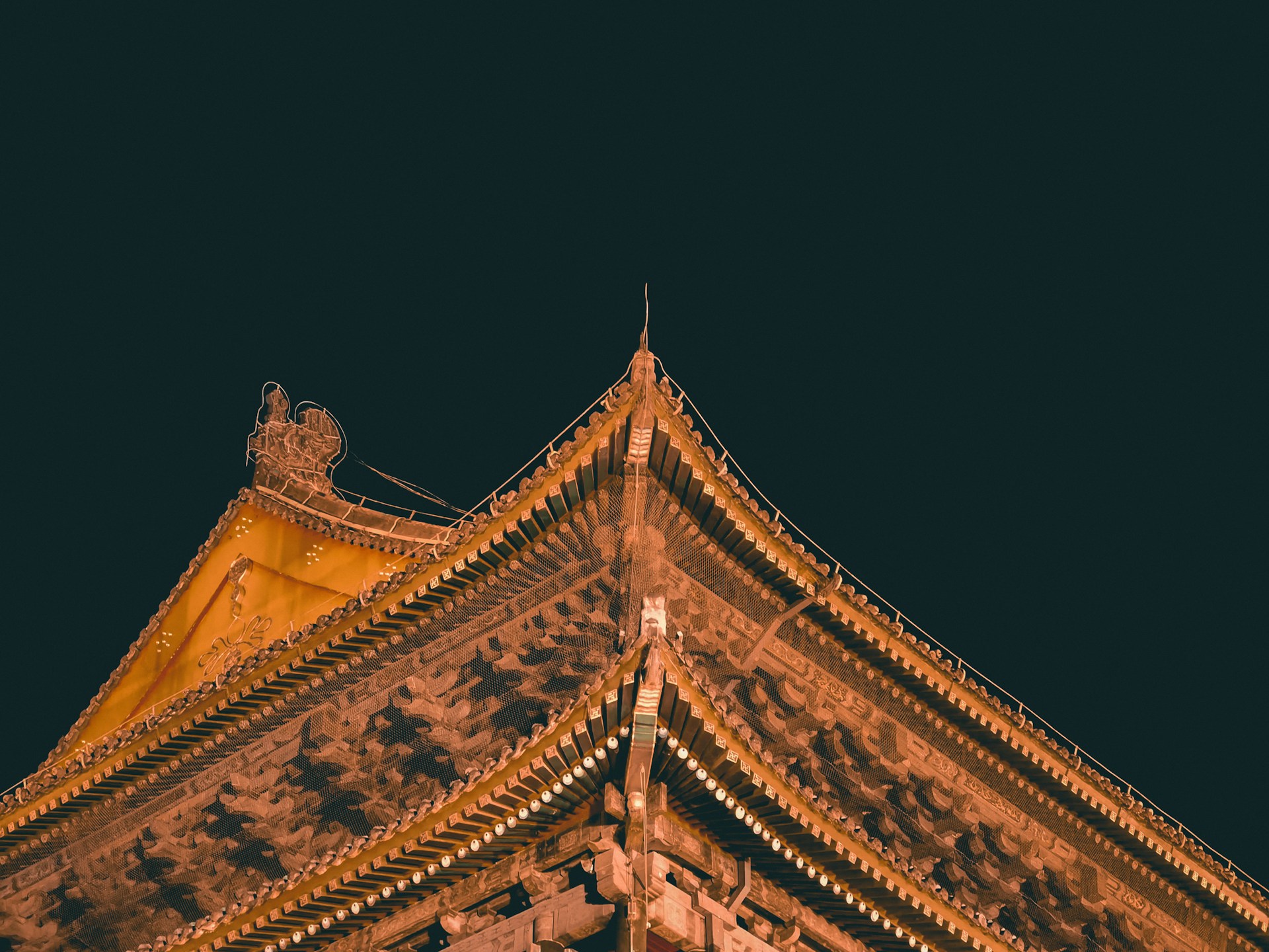 woman wearing yellow long-sleeved dress under white clouds and blue sky during daytime