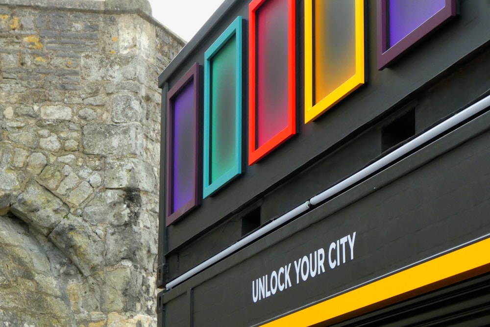 black yellow green blue red and purple wooden window