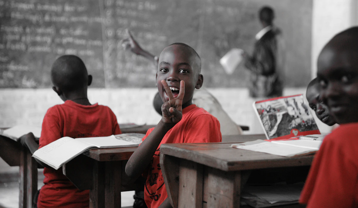 Black teacher working efficiently with AI-powered tools in a Nairobi school