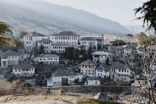 white and gray concrete buildings during daytime in Gjirokastër Albania