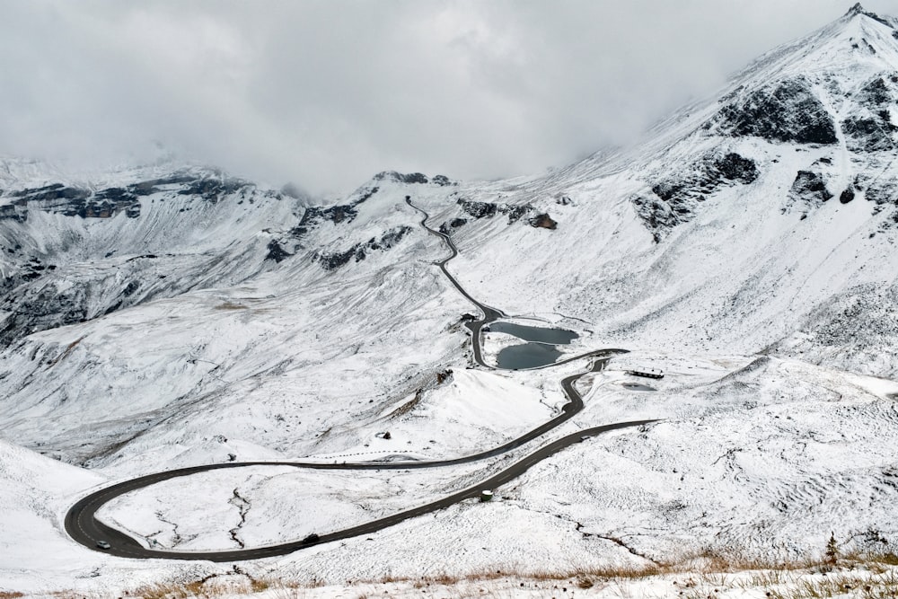 snow covered mountain during daytime