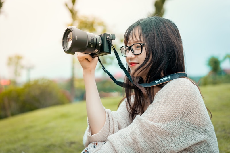 Creative woman with camera in Perth