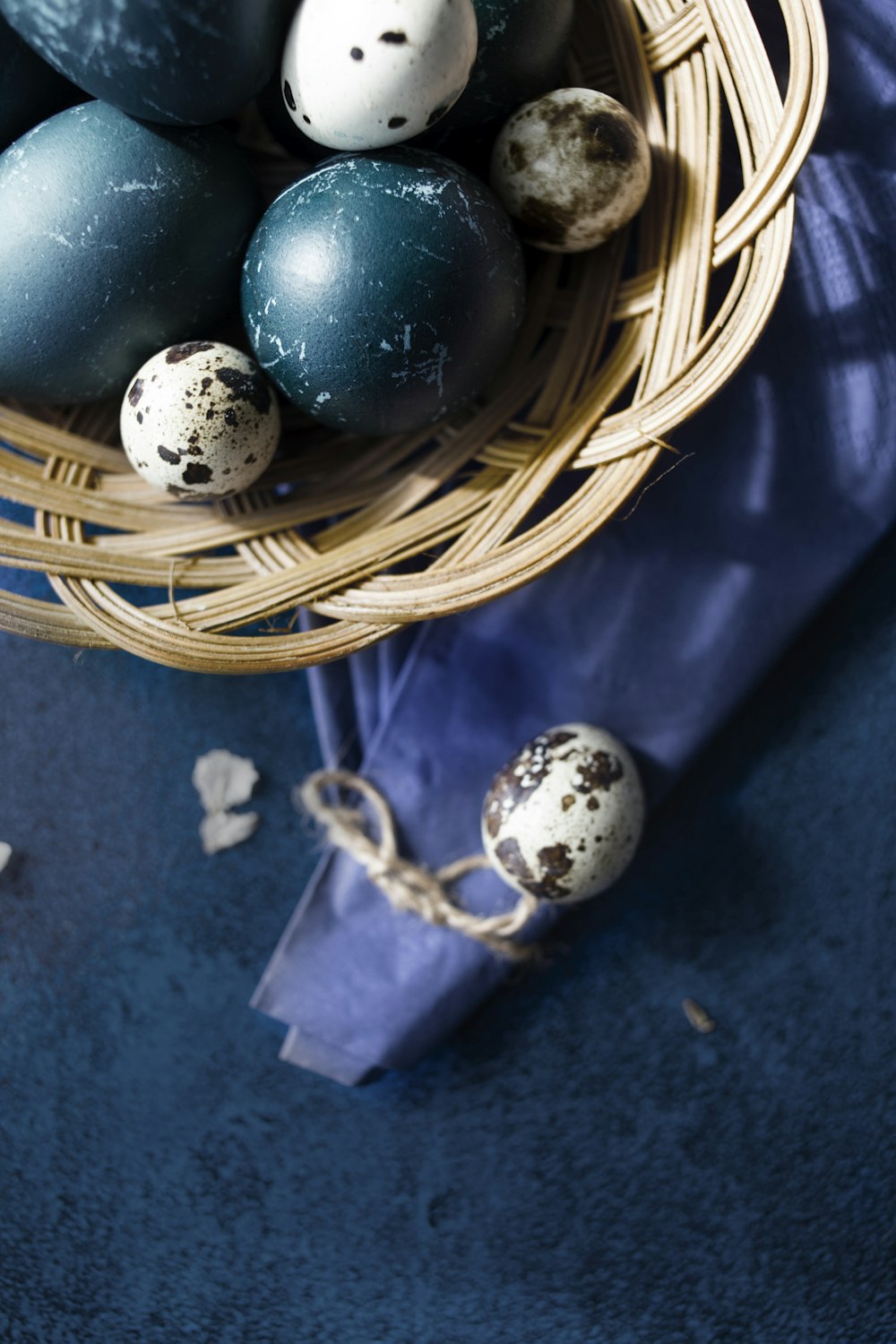 blue and white baubles on brown woven basket