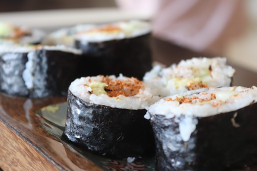 white and yellow rice on black ceramic plate