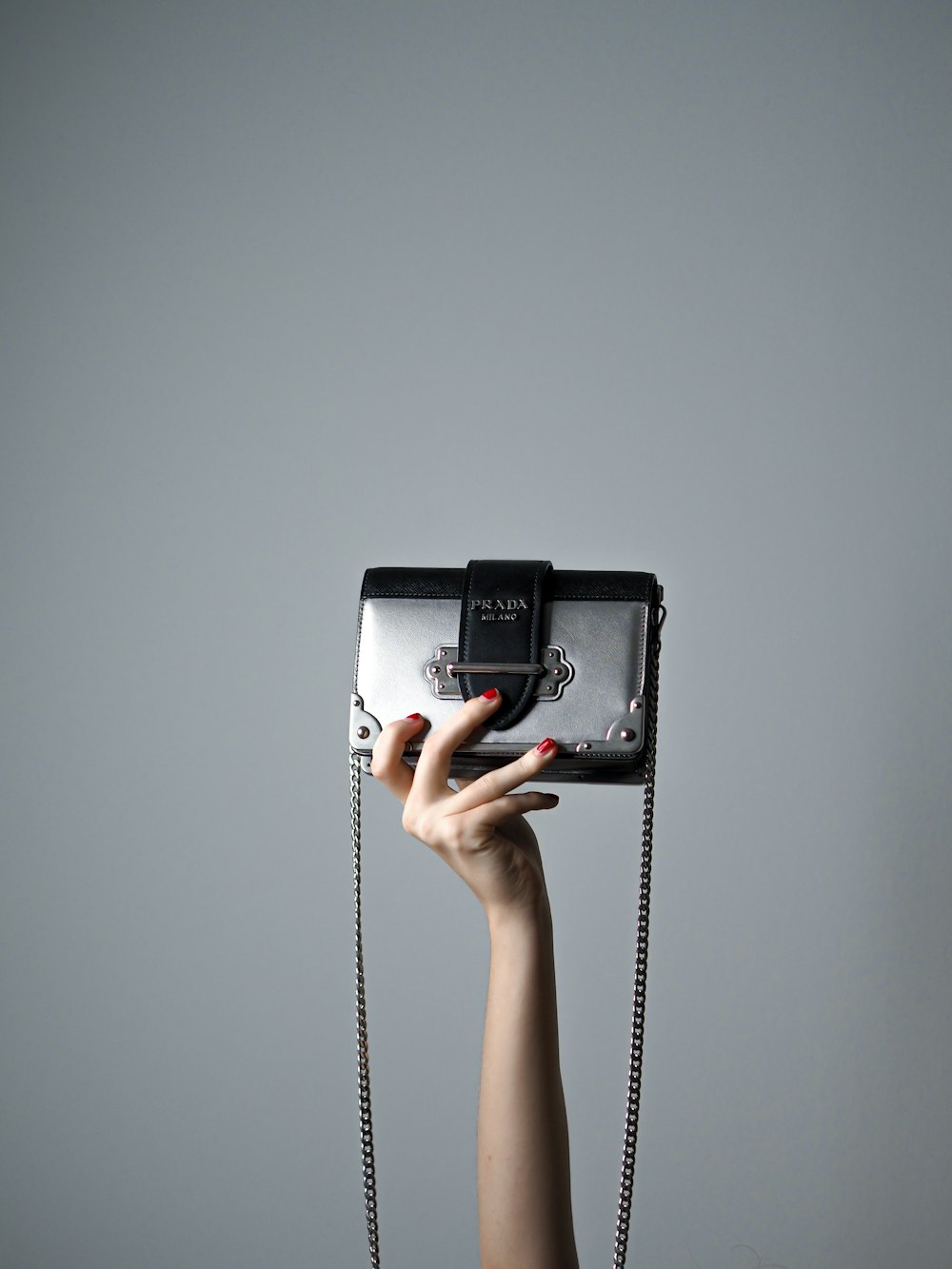 black and white telephone on white wall