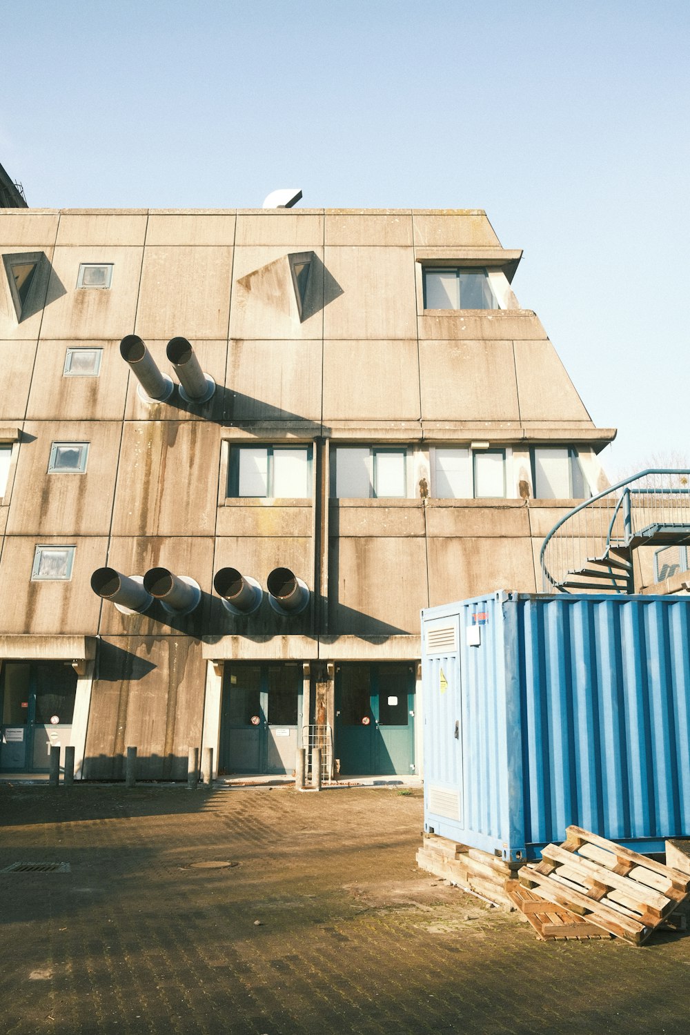 brown and white concrete building during daytime