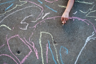person standing on gray sand