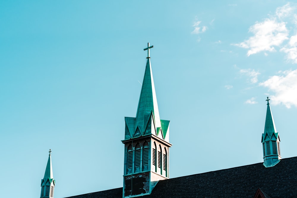 white and green church under blue sky during daytime