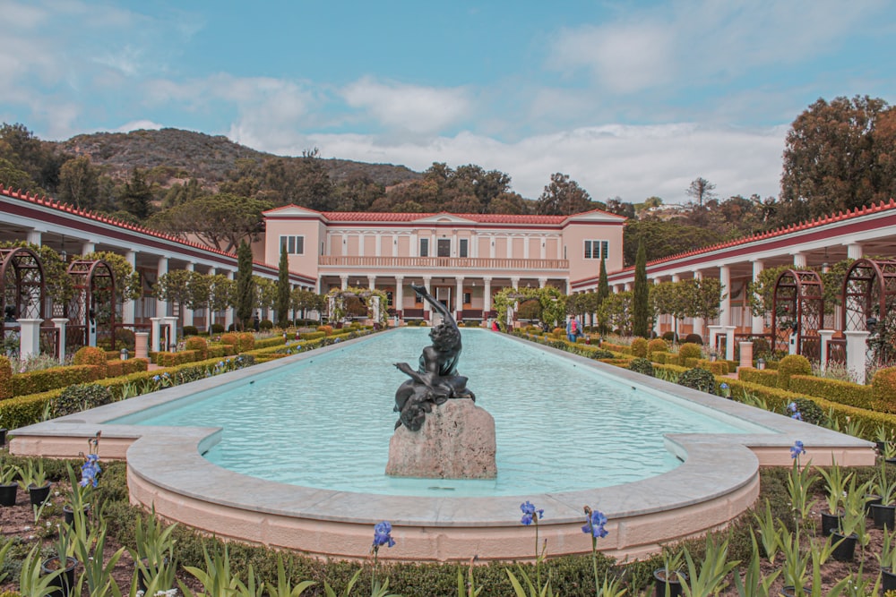 black statue on swimming pool