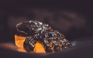 Close-up of a legendary weapon glowing with ancient power in siwa77