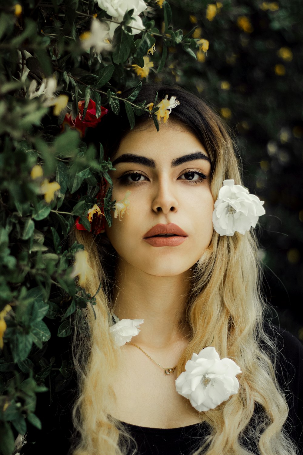 woman in white floral head dress