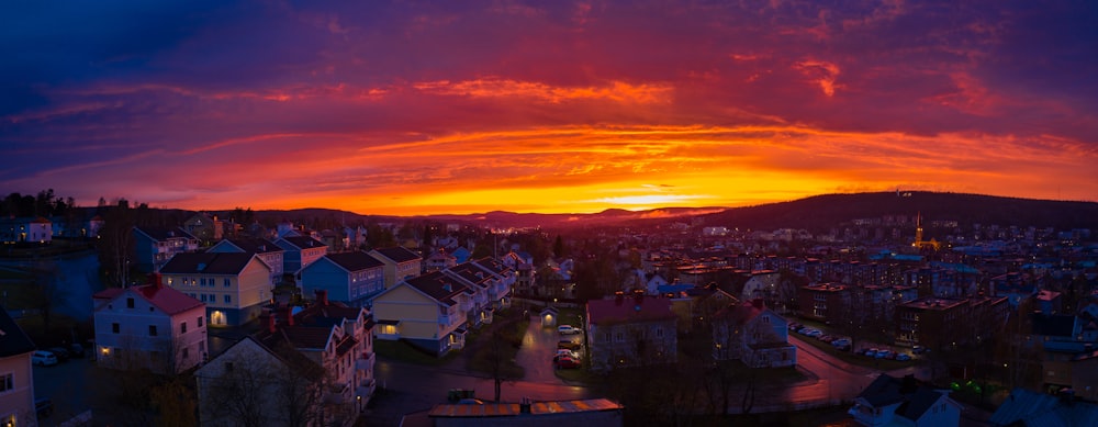 city with high rise buildings during sunset