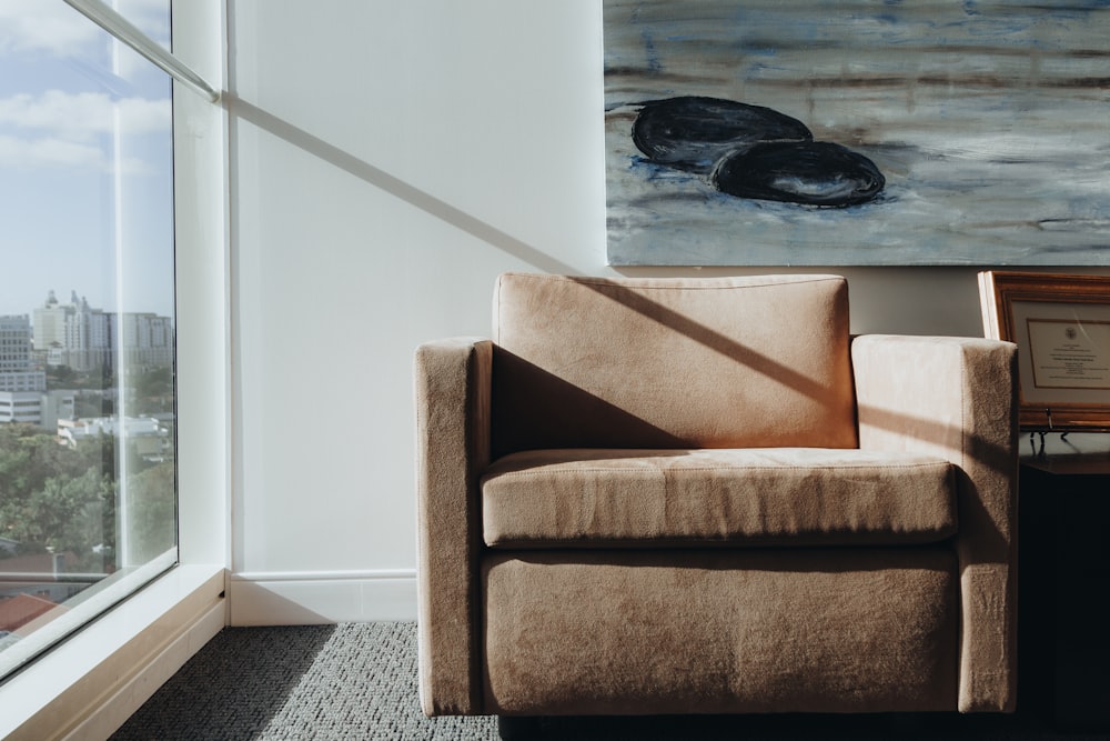 brown and beige sofa chair