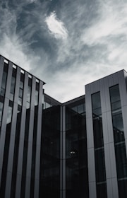 Wide shot of a modern commercial building showcasing Metalux's signature metal cladding and structural details.