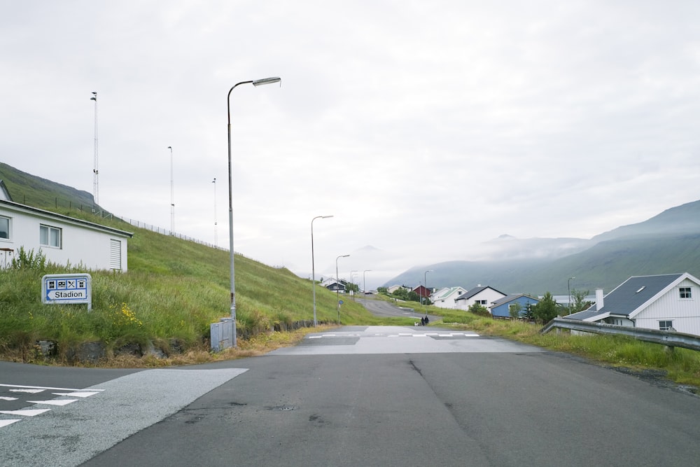 white airplane on gray asphalt road during daytime