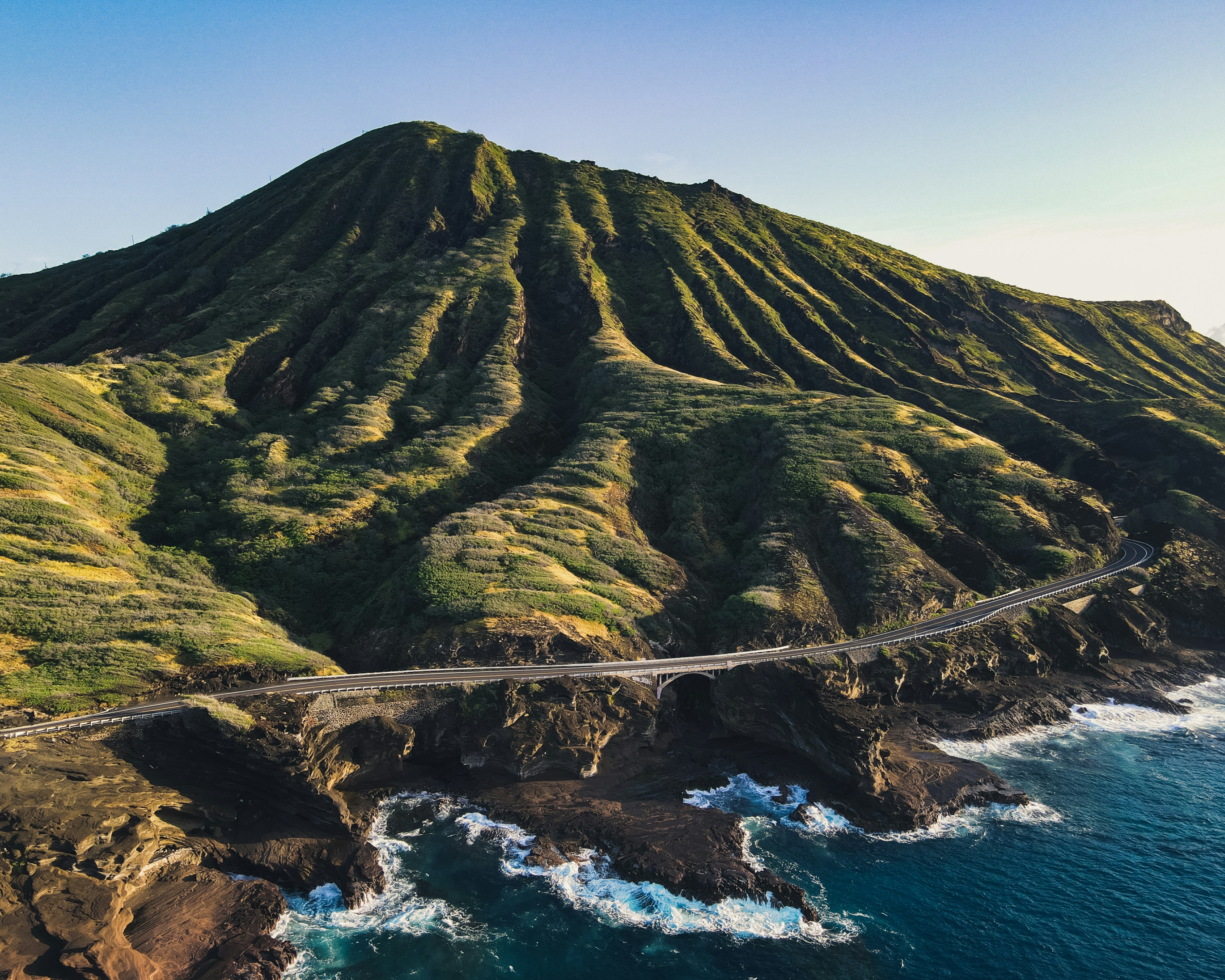 green and brown mountain beside sea during daytime, koko head crater</p><p>
