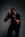 man in black t-shirt holding black dslr camera