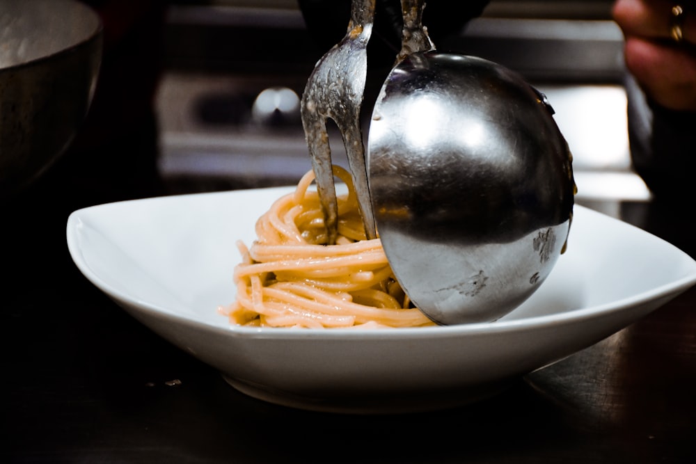 pasta dish on white ceramic plate