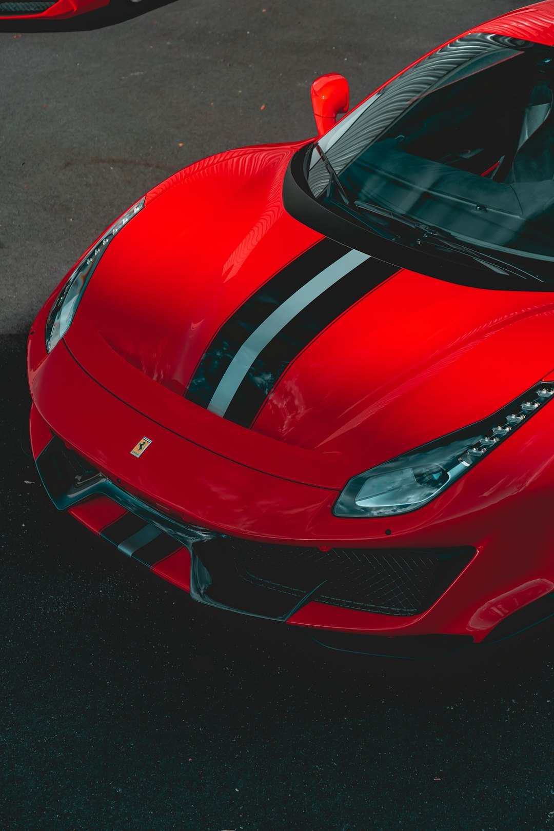 red ferrari car on road