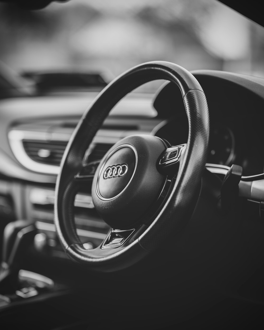 black and silver steering wheel