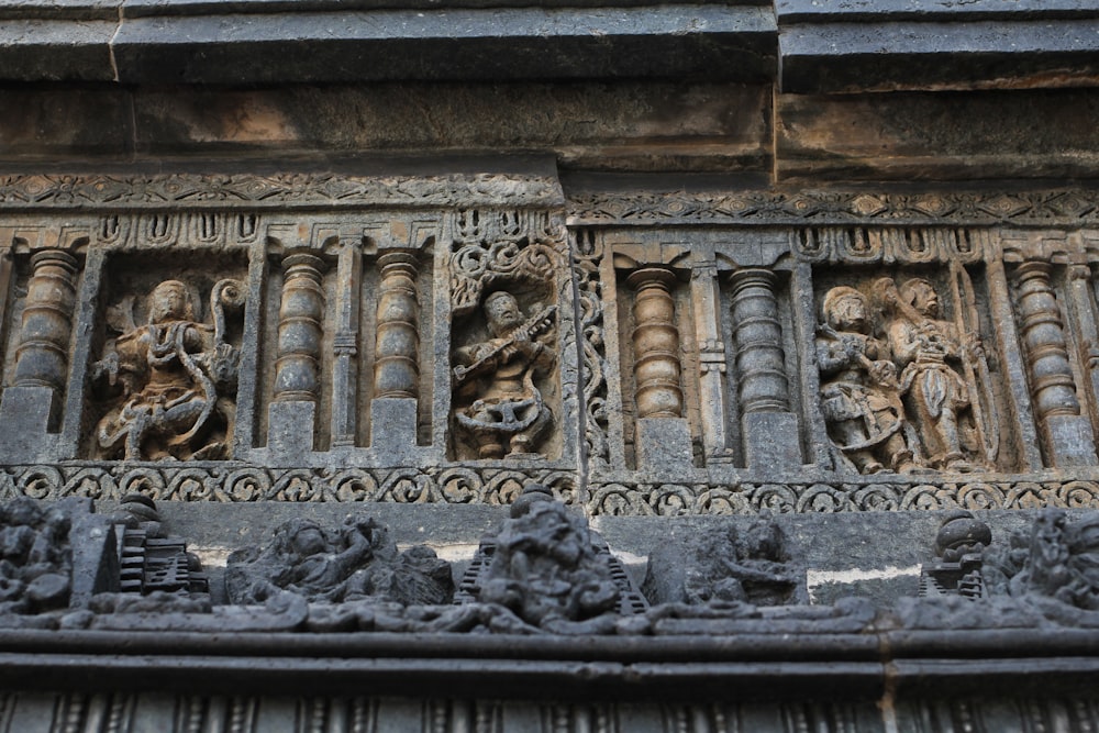 gray concrete building with statues