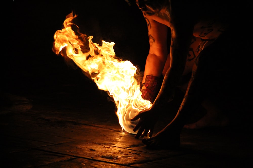 person holding fire during night time