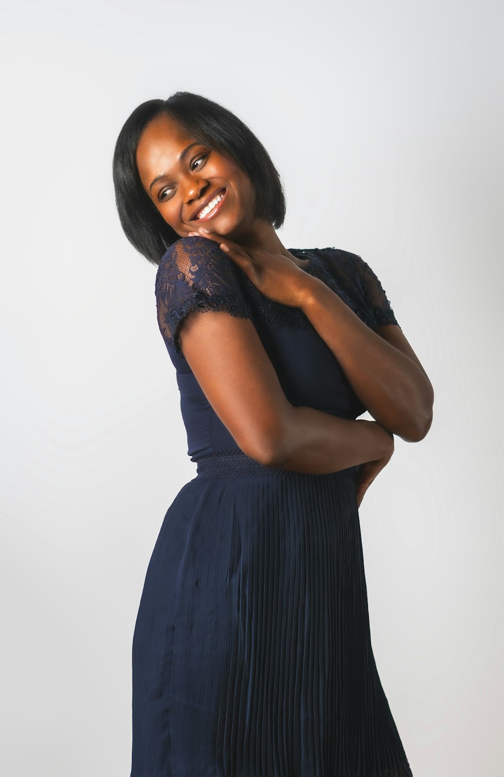 woman in blue sleeveless dress