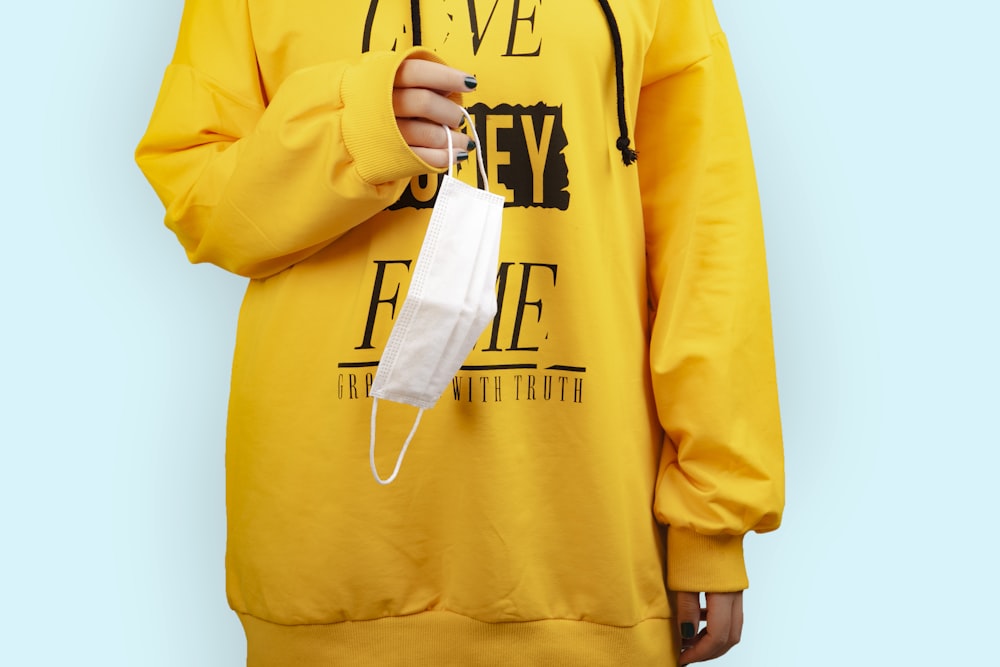yellow and white crew neck long sleeve shirt