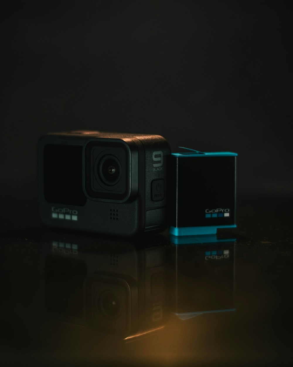 black and blue nikon camera
