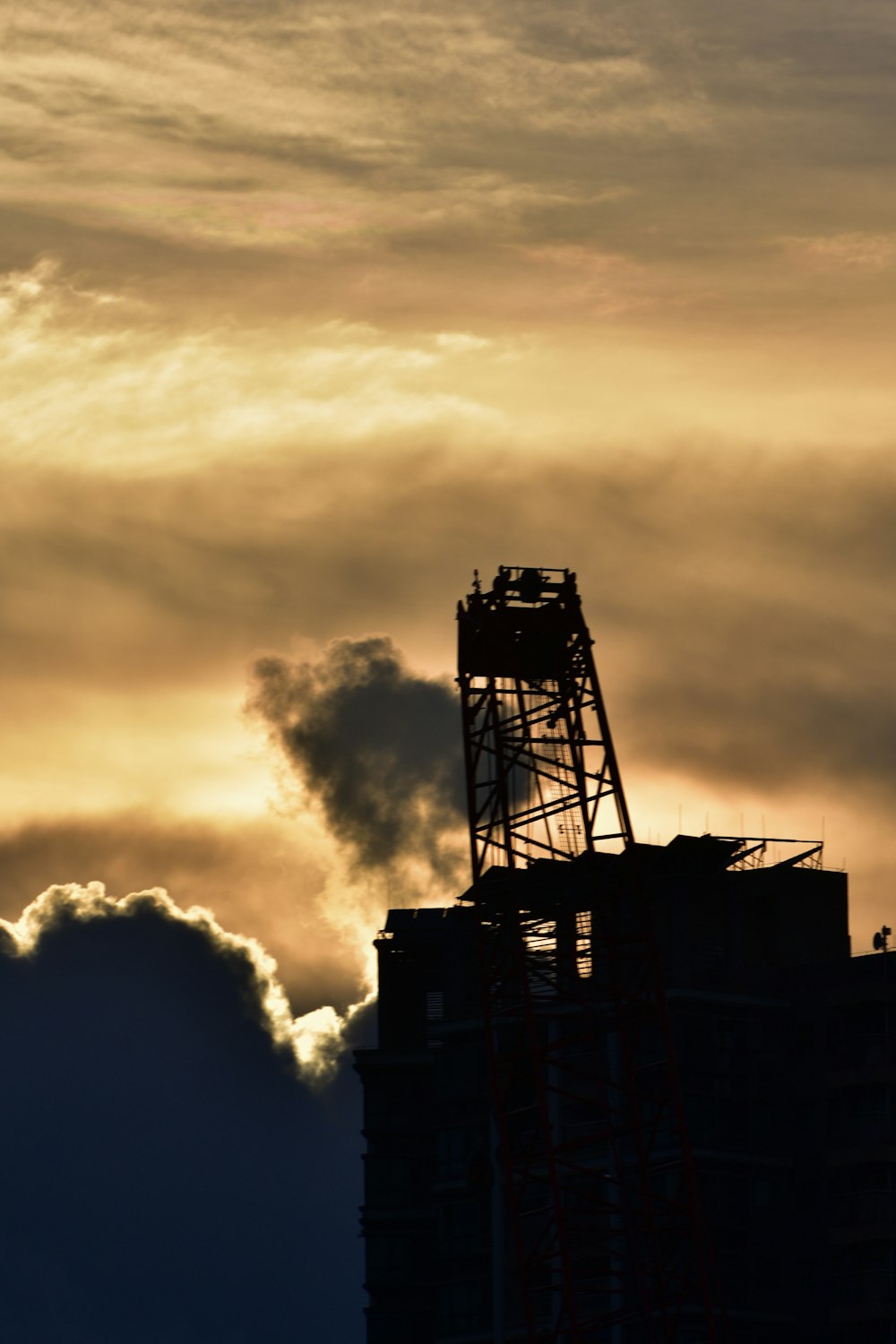 silhouette of building during sunset