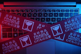 red and black laptop computer