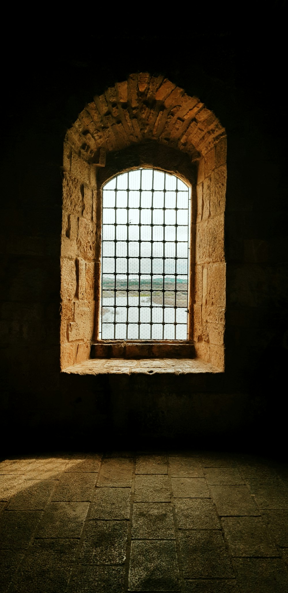 brown wooden framed glass window