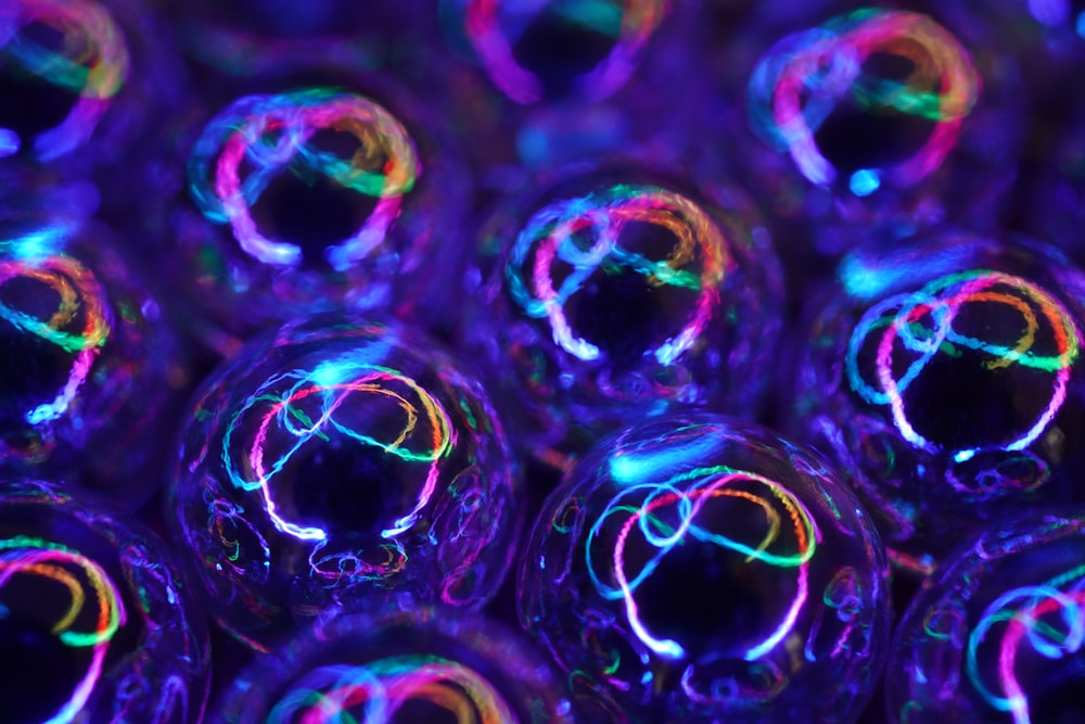 purple and blue bubbles in close up photography