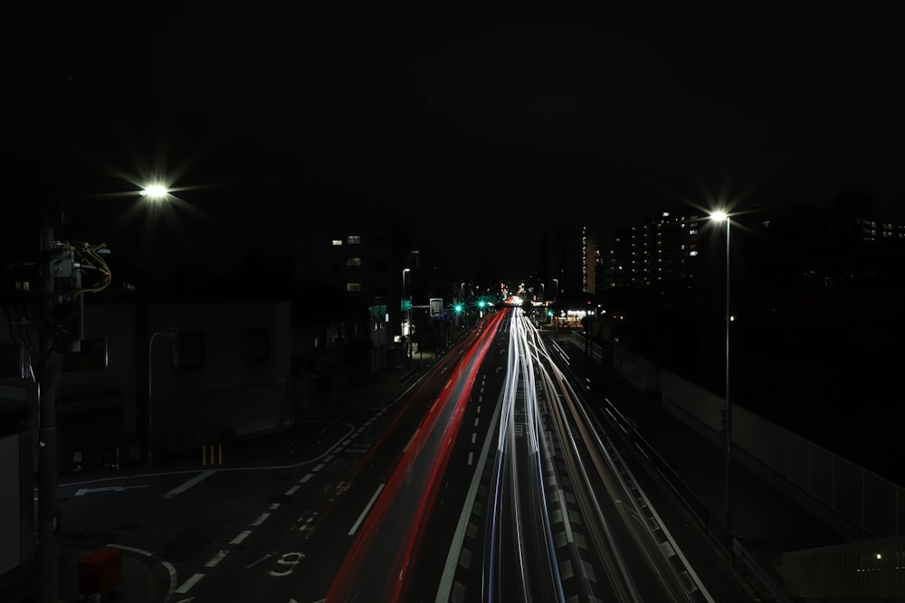 time lapse photography of cars on road during night time