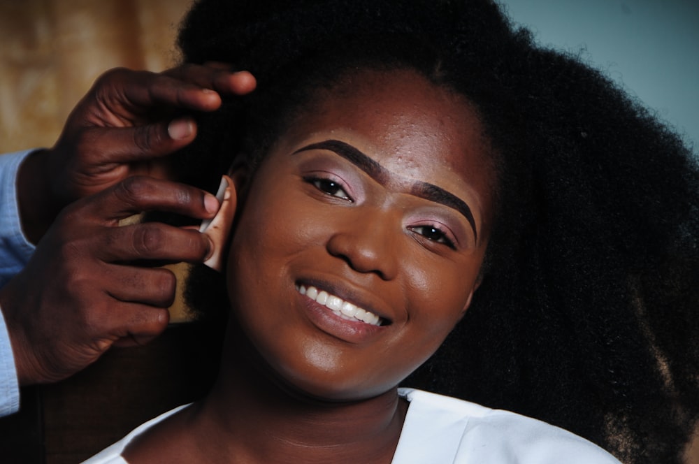 smiling girl in white shirt