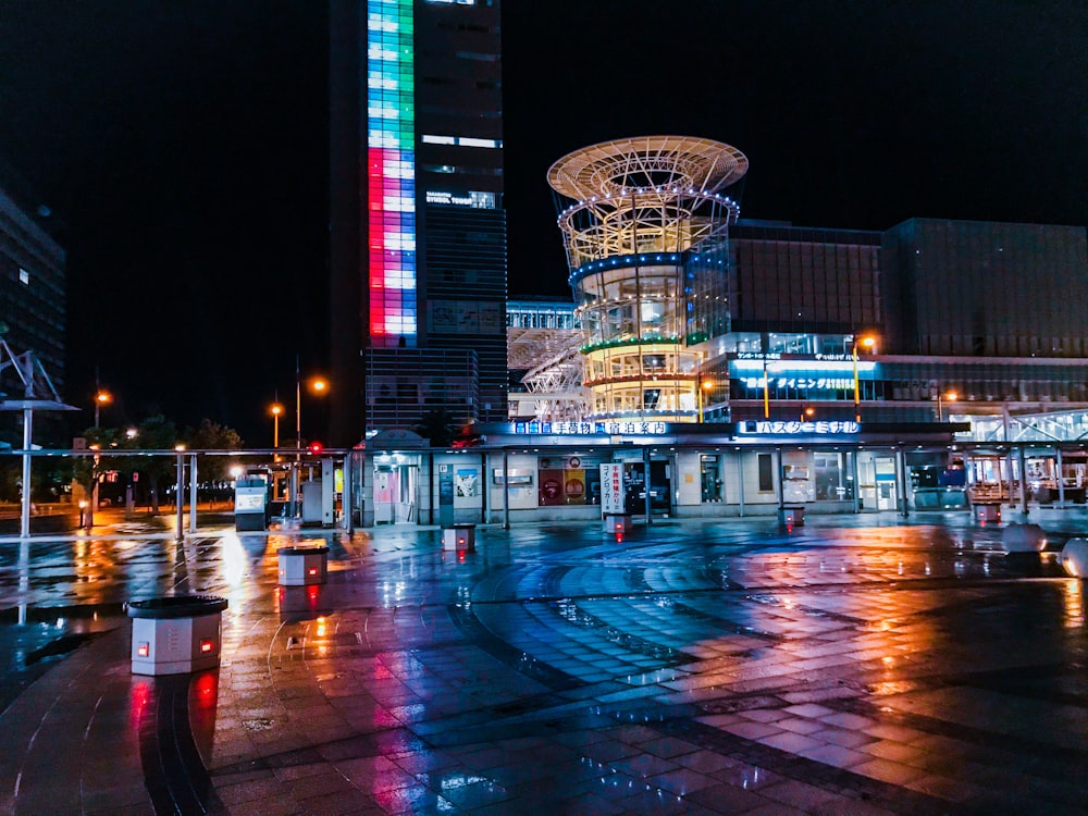 people walking on street during night time