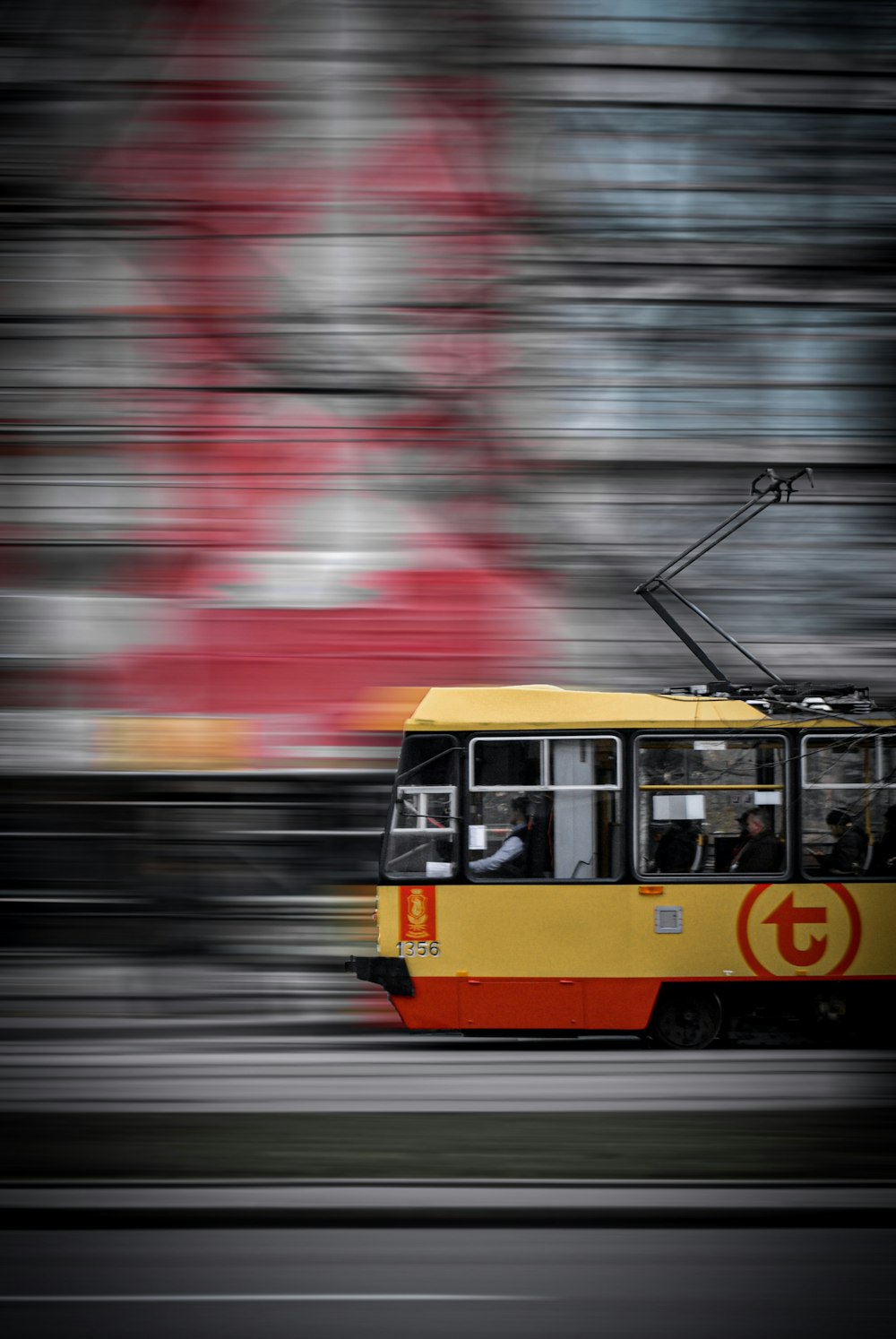 yellow and white train on rail