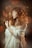 woman in white dress with red hair