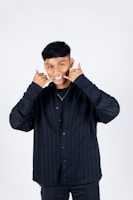 man in black dress shirt
